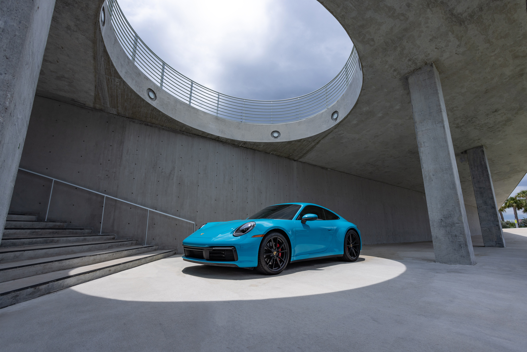 light-blue-porsche-in-garage-setting.jpg 